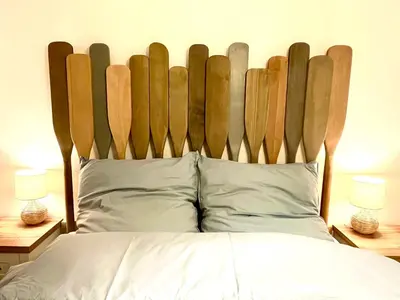 Ein Bett oder Betten in einem Zimmer der Unterkunft In Wurfweite zum Strand, Zentrum & Kurpark- FeWo Fischers Fritz