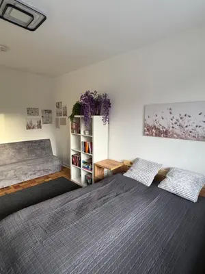 Ein Bett oder Betten in einem Zimmer der Unterkunft Gemütliche Ostsee Oase, 3 Zimmer mit Balkon in Bad Schwartau