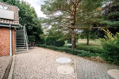 Ein Garten an der Unterkunft Kleine Auszeit