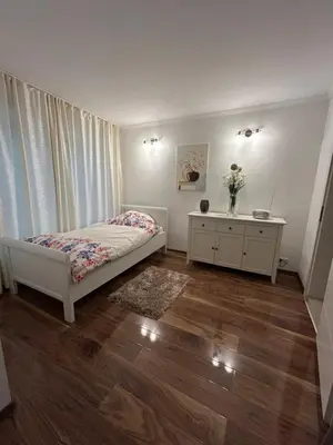Ein Bett oder Betten in einem Zimmer der Unterkunft Central Apartment