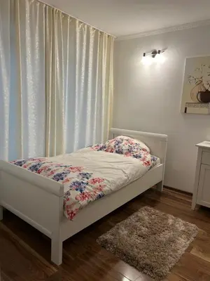 Ein Bett oder Betten in einem Zimmer der Unterkunft Central Apartment