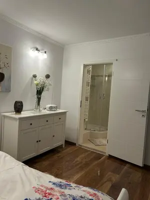 Ein Bett oder Betten in einem Zimmer der Unterkunft Central Apartment