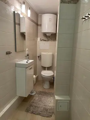 Ein Badezimmer in der Unterkunft Central Apartment