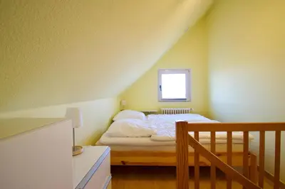 Ein Bett oder Betten in einem Zimmer der Unterkunft Ferienwohnung Hideaway