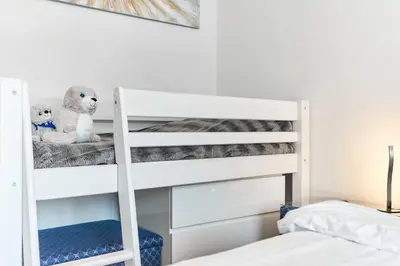 Ein Bett oder Betten in einem Zimmer der Unterkunft Moin am Meer! Hansastr 5 a