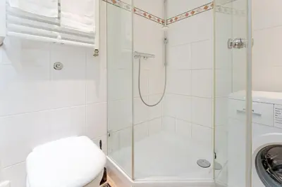 Ein Badezimmer in der Unterkunft An der Waldkapelle 26 OstseePanorama 19
