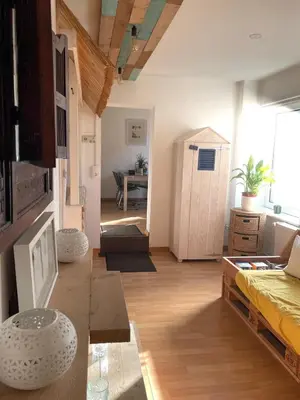 Ein Bett oder Betten in einem Zimmer der Unterkunft Geibel-Haus Fewo Wellenbrecher bis 4 Personen