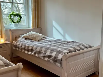 Ein Bett oder Betten in einem Zimmer der Unterkunft Ferienhaus 
