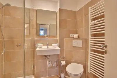 Ein Badezimmer in der Unterkunft Haus Meeresstrand Appartement 116