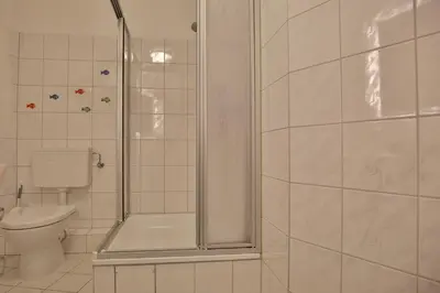 Ein Badezimmer in der Unterkunft Maison Baltique Niendorf Appartement Shoreline Haven 2