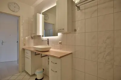 Ein Badezimmer in der Unterkunft Maison Baltique Niendorf Appartement Shoreline Haven 2