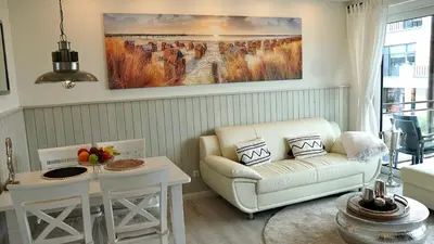 Ein Sitzbereich in der Unterkunft Ferienwohnung Strandblick