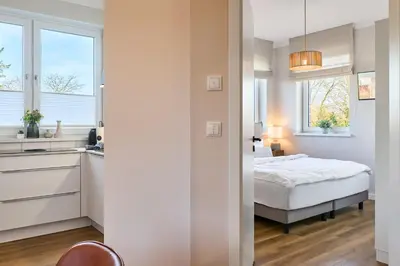 Ein Bett oder Betten in einem Zimmer der Unterkunft Saltwater House Scharbeutz Sail Away Scharbeutz