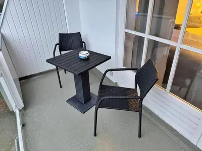 Ein Sitzbereich in der Unterkunft Obj 25 Top FeWo Mönkemeier für 2 Personen + 1 Kleinkind bis 3 Jahre Hund