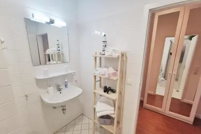 Ein Badezimmer in der Unterkunft Obj 25 Top FeWo Mönkemeier für 2 Personen + 1 Kleinkind bis 3 Jahre Hund
