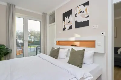 Ein Bett oder Betten in einem Zimmer der Unterkunft Saltwater House Scharbeutz Sea Eagle Scharbeutz