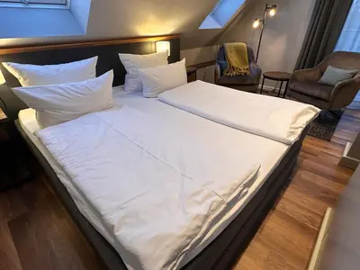 Ein Bett oder Betten in einem Zimmer der Unterkunft 4Hafenzeiten - NIE13 Eva