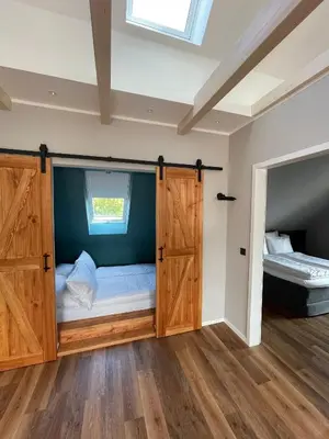 Ein Bett oder Betten in einem Zimmer der Unterkunft 4Hafenzeiten - NIE9 Lotte