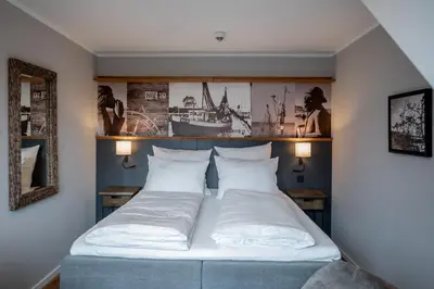 Ein Bett oder Betten in einem Zimmer der Unterkunft 4Hafenzeiten - NIE10 Gertrud II