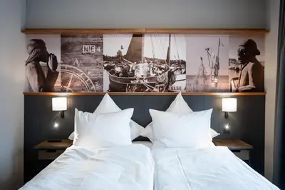 Ein Bett oder Betten in einem Zimmer der Unterkunft 4Hafenzeiten - NIE4 Else