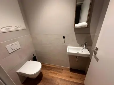 Ein Badezimmer in der Unterkunft 4Hafenzeiten - NIE8 Albatros