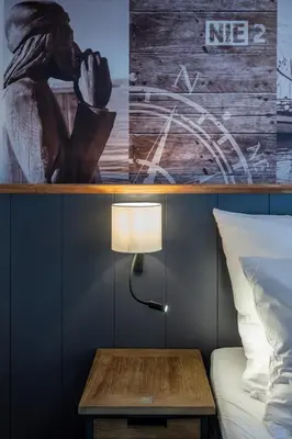 Ein Bett oder Betten in einem Zimmer der Unterkunft 4Hafenzeiten - NIE2 Heimat
