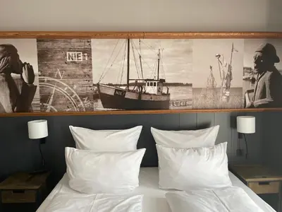 Ein Bett oder Betten in einem Zimmer der Unterkunft 4Hafenzeiten - NIE1 Lucie