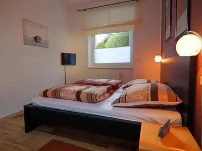 Ein Bett oder Betten in einem Zimmer der Unterkunft Stylish Ground-Floor Stay