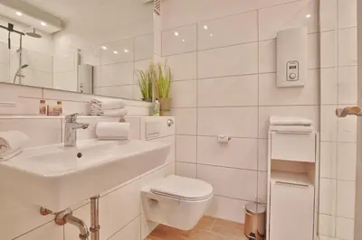 Ein Badezimmer in der Unterkunft Haus Adria Appartement 28 Küstenliebe