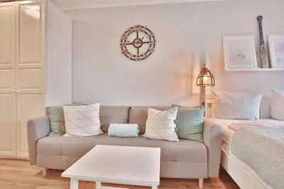 Ein Sitzbereich in der Unterkunft Haus Adria Appartement 28 Küstenliebe