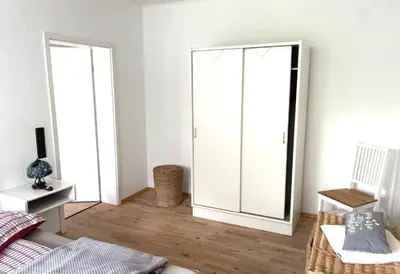 Ein Bett oder Betten in einem Zimmer der Unterkunft Großartige Wohnung mit großem Garten in Bad Schwartau!