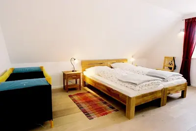 Ein Bett oder Betten in einem Zimmer der Unterkunft Ferienhaus 