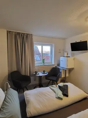 Ein Bett oder Betten in einem Zimmer der Unterkunft Ankerplatz