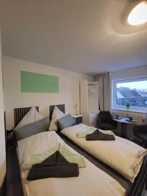 Ein Bett oder Betten in einem Zimmer der Unterkunft Ankerplatz
