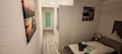 Ein Bett oder Betten in einem Zimmer der Unterkunft Ankerplatz
