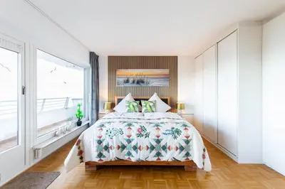 Ein Bett oder Betten in einem Zimmer der Unterkunft Ferienwohnung Residenz App. 611 Timmendorfer Strand