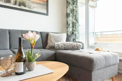 Ein Sitzbereich in der Unterkunft Ferienwohnung Residenz App. 612 Timmendorfer Strand