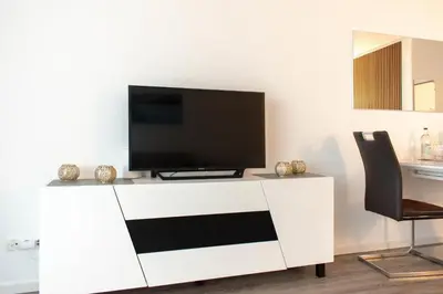 TV/Unterhaltungsangebot in der Unterkunft Ferienwohnung Residenz App. 101 Timmendorfer Strand