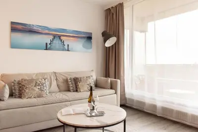Ein Sitzbereich in der Unterkunft Ferienwohnung Residenz App. 101 Timmendorfer Strand