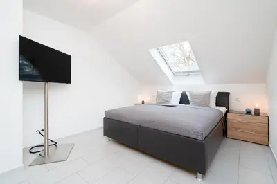 Ein Bett oder Betten in einem Zimmer der Unterkunft Sundowner
