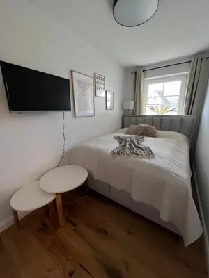 Ein Bett oder Betten in einem Zimmer der Unterkunft Cosy Dream Scharbeutz