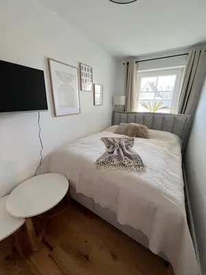 Ein Bett oder Betten in einem Zimmer der Unterkunft Cosy Dream Scharbeutz