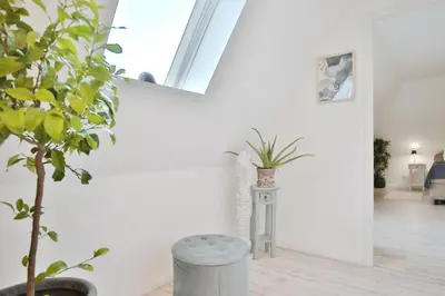 Ein Sitzbereich in der Unterkunft Am Wittinghaaf Ankerherz
