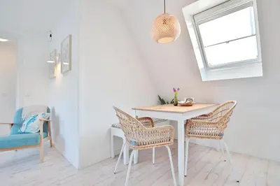 Ein Sitzbereich in der Unterkunft Am Wittinghaaf Ankerherz