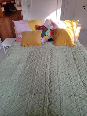 Ein Bett oder Betten in einem Zimmer der Unterkunft Sonniges Appartment in Jugendstilvilla