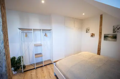 Ein Bett oder Betten in einem Zimmer der Unterkunft HejU - Charmanter Altbau für 8 oder 6