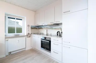Küche/Küchenzeile in der Unterkunft Ferienwohnung Möwensand