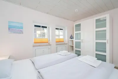 Ein Bett oder Betten in einem Zimmer der Unterkunft Ferienwohnung Möwensand