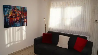 Ein Sitzbereich in der Unterkunft Ferienwohnung Schlichting