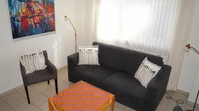 Ein Sitzbereich in der Unterkunft Ferienwohnung Schlichting